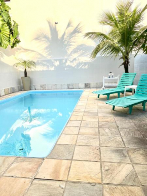 Casa com piscina em Piratininga